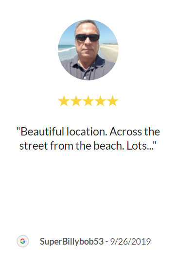 A man with five stars on his review of the beach.